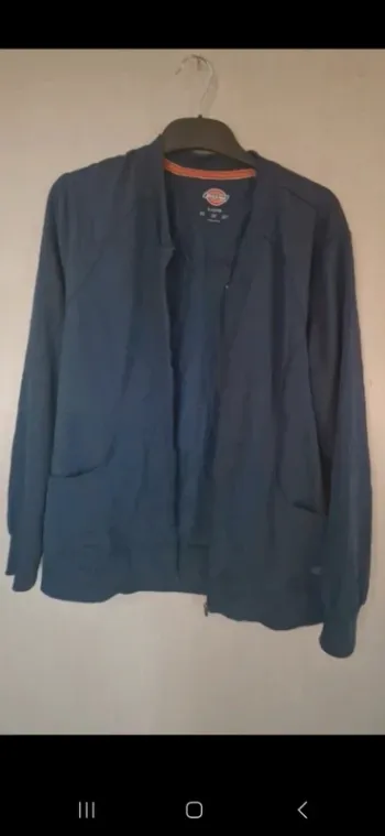 Veste légère dickies taille l tres bon. Etat