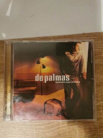 CD De palmas. Marcher dans le sable