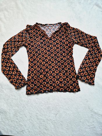 Joli haut marron et noir motifs géométriques