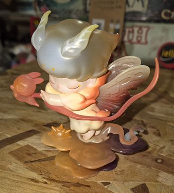 Figurine mokoko finding the light popmart 