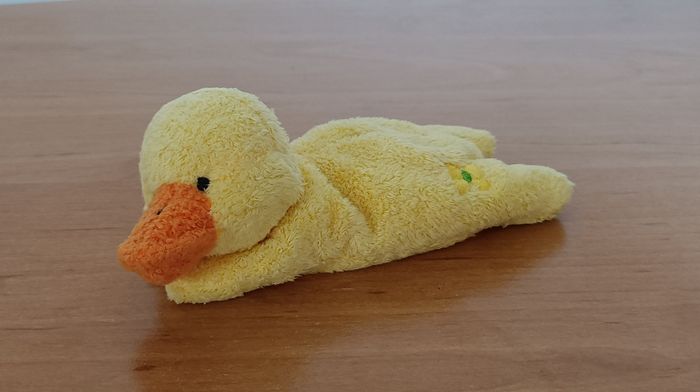 Peluche Doudou canard jaune. 15 cm