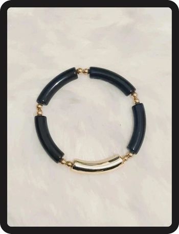 Bracelet tube noir doré