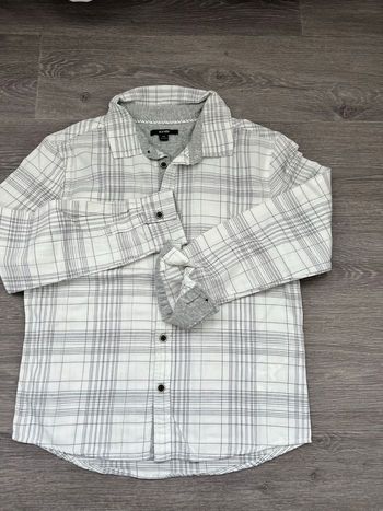 Chemise à carreaux avec manche