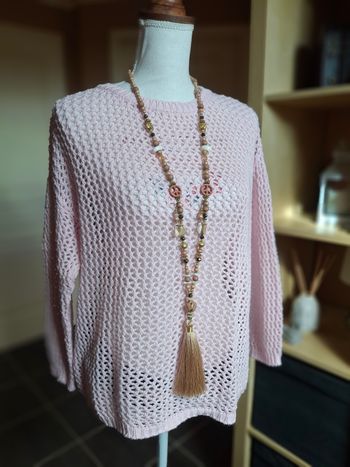 Pull rose pâle maille ajourée