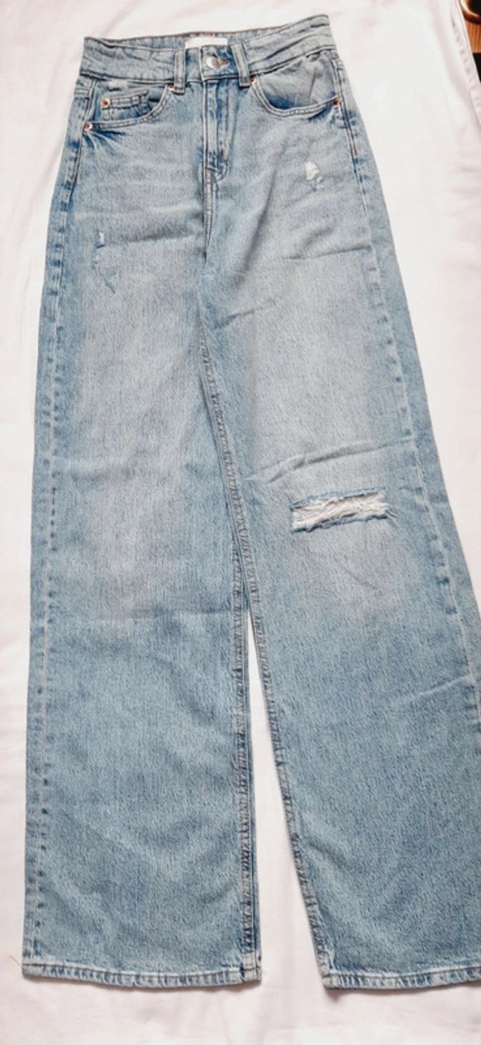 Jeans évasés troués - photo numéro 2
