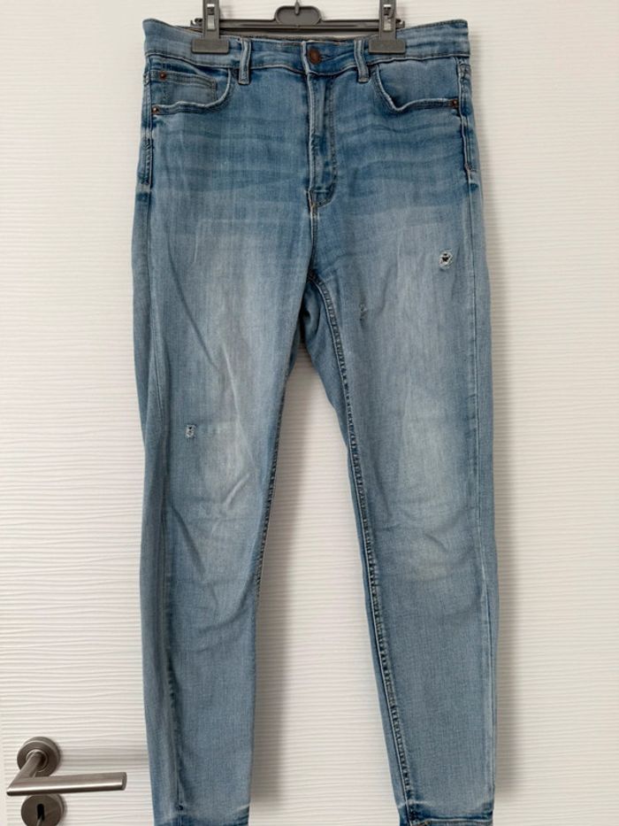 Jean slim skinny taille haute bleu clair délavé uni basique simple