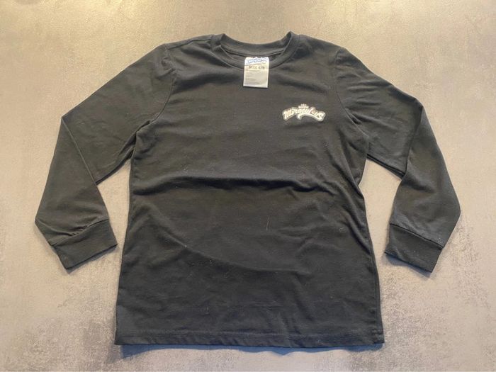 T-shirt noir longues manches Miraculous taille 6/8 ans Culture Fly