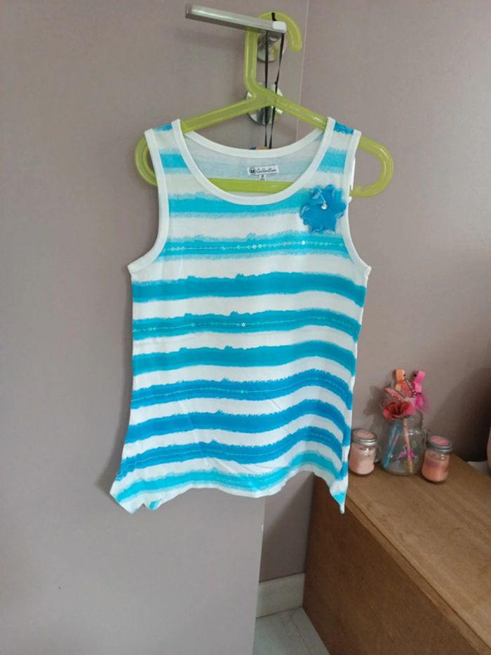 Tunique bleu turquoise taille 8 ans