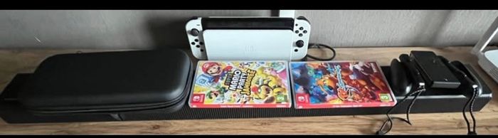 Nintendo switch oled + 2 jeux