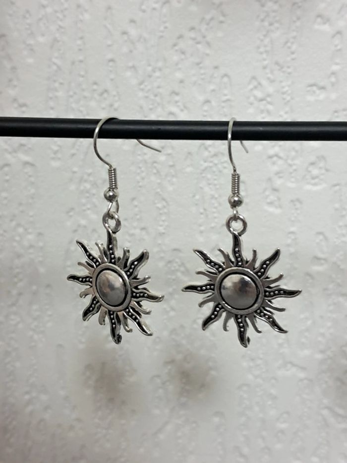 Boucle d'oreille soleil