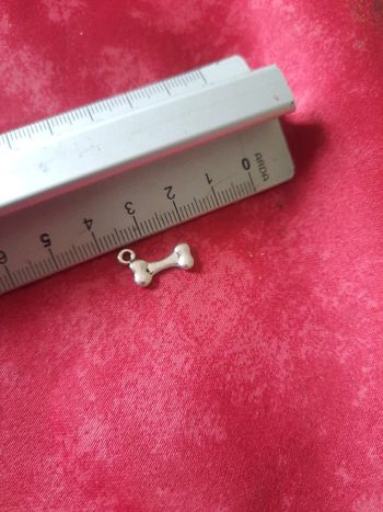 Pendentif collier forme os original