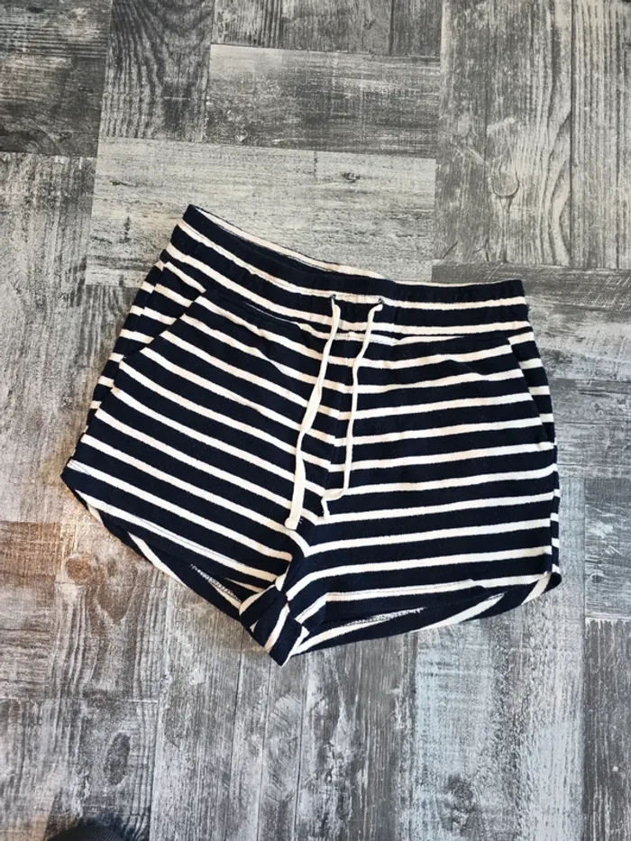 Short marin primark bleu et blanc