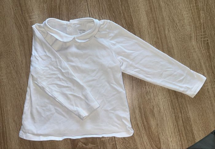 Haut blanc avec col
