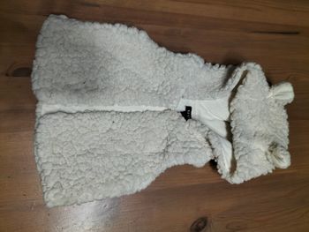 Veste moumoute avec capuche sans manche 1 mois