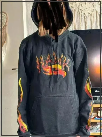 Pull  flamme  taille 14ans  marque ha  k