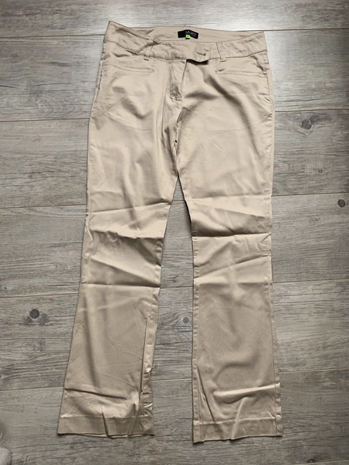 Pantalon beige brillant taille 40