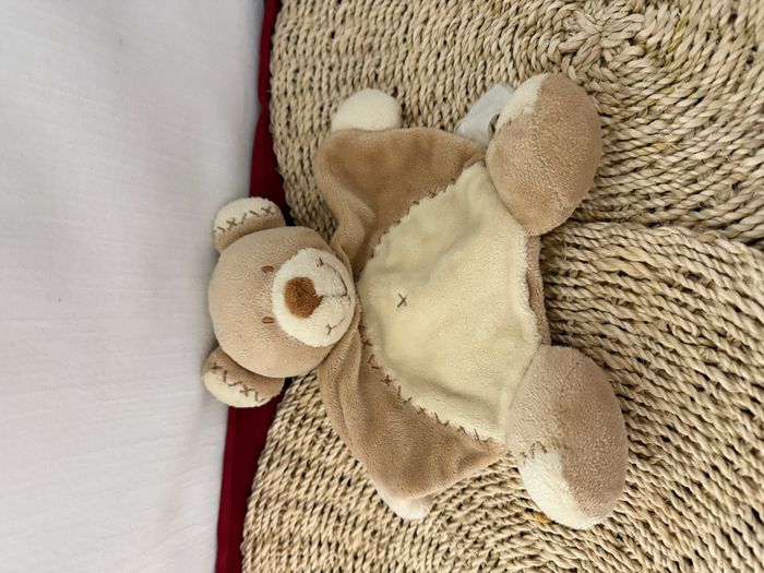 DOUDOU PLAT ARRONDI NICOTOY SIMBA OURS BASTIEN ECRU MARRON BEIGE CROIX - photo numéro 2