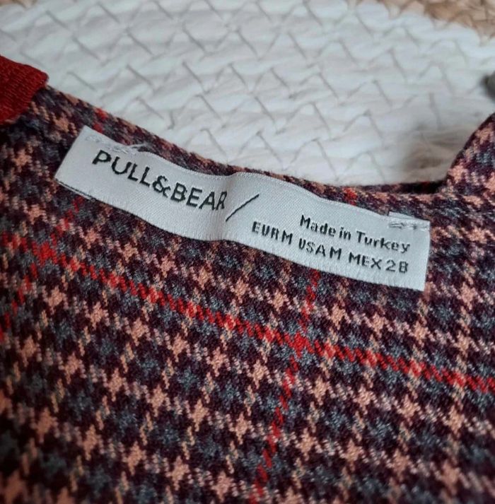 Jolie robe à bretelles Pull & Bear
Motif tweed - photo numéro 6