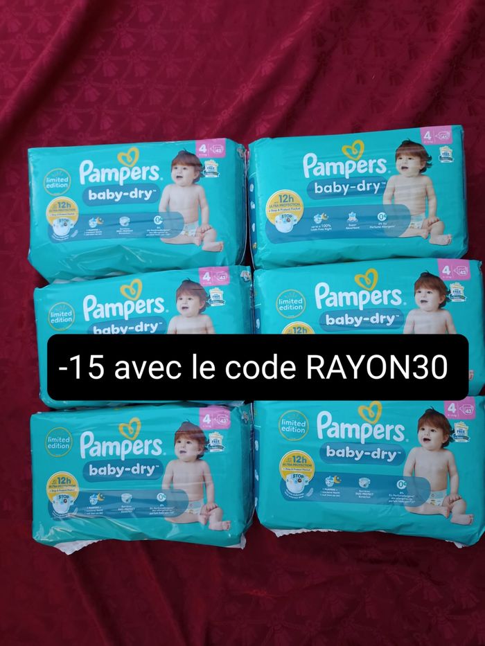 Six paquets de couches Pampers baby-dry T4 taille 4