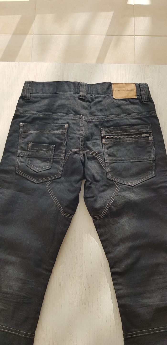 Jean noir 14 ans neuf