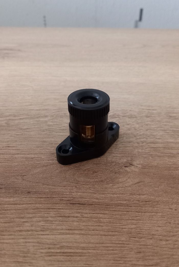 Borne anti-cisaillement ancienne en bakélite et laiton.