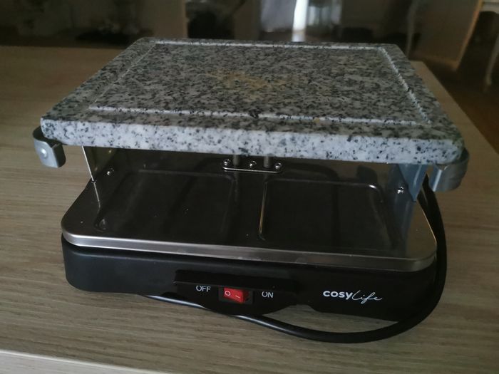 Appareil à raclette avec pierrade