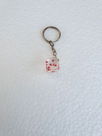 Porte-clés dés transparent et touge neuf