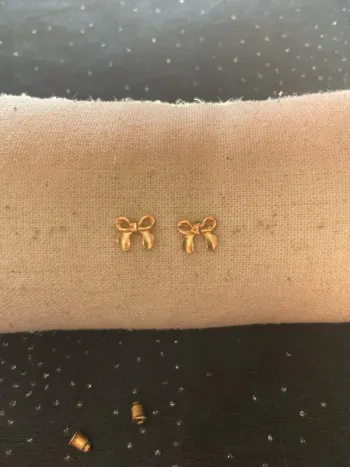 Boucles d'oreilles noeud dorées