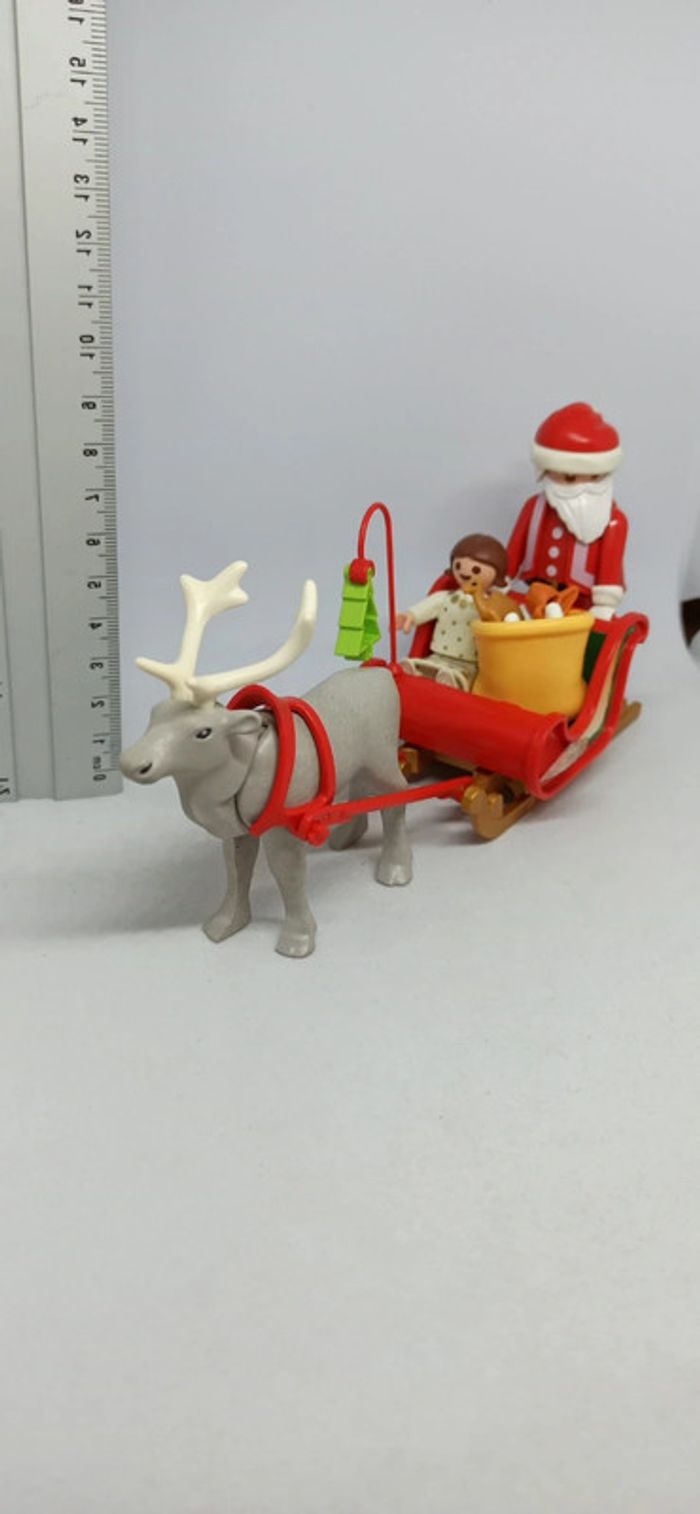 Traîneau de père Noël avec cadeaux et ange playmobil