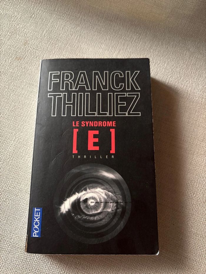 Livre Le Syndrome E – Franck Thilliez • Thriller scientifique • Enquête & suspense haletant