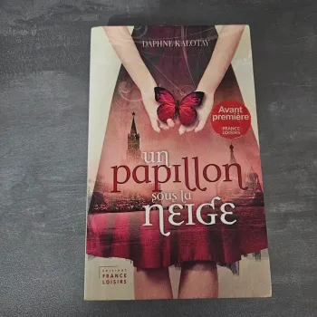 Livre un papillon sous la neige