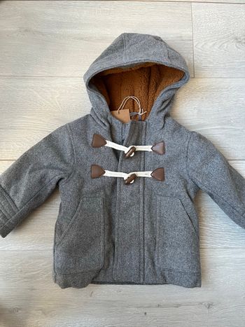 Manteau neuf 9 mois