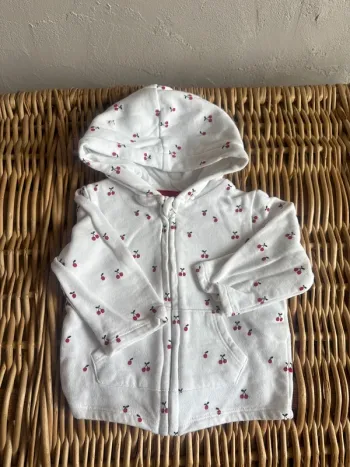 Veste cerise Kiabi 9mois en très bon état