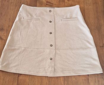 Mini jupe boutons devant