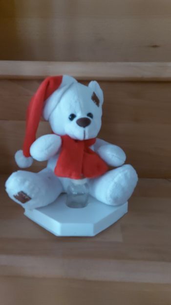 Ourson peluche sur support