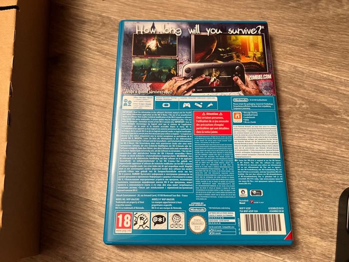 Console Wii U pack collector Zombi U en boite excellent état - photo numéro 19
