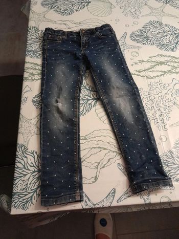 Jeans motifs triangle