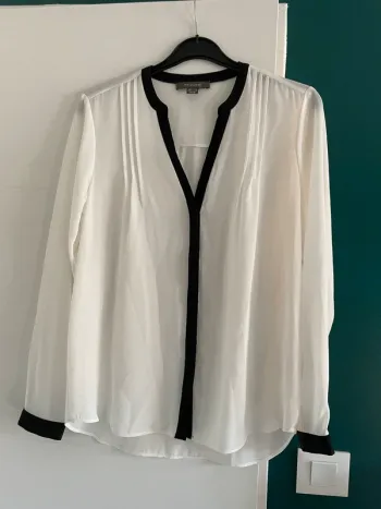 Jolie blouse noire et blanche