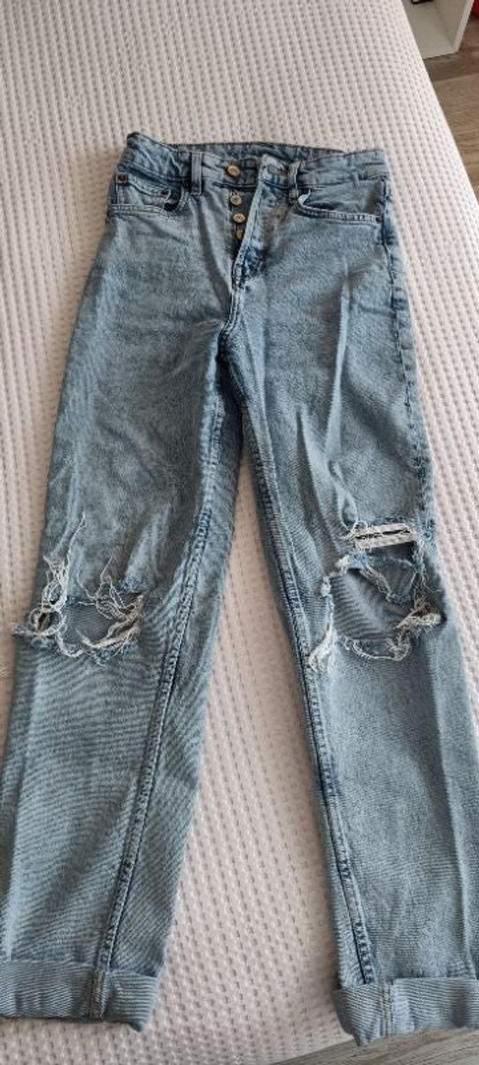 Jean femme 34 HetM bleu à trous