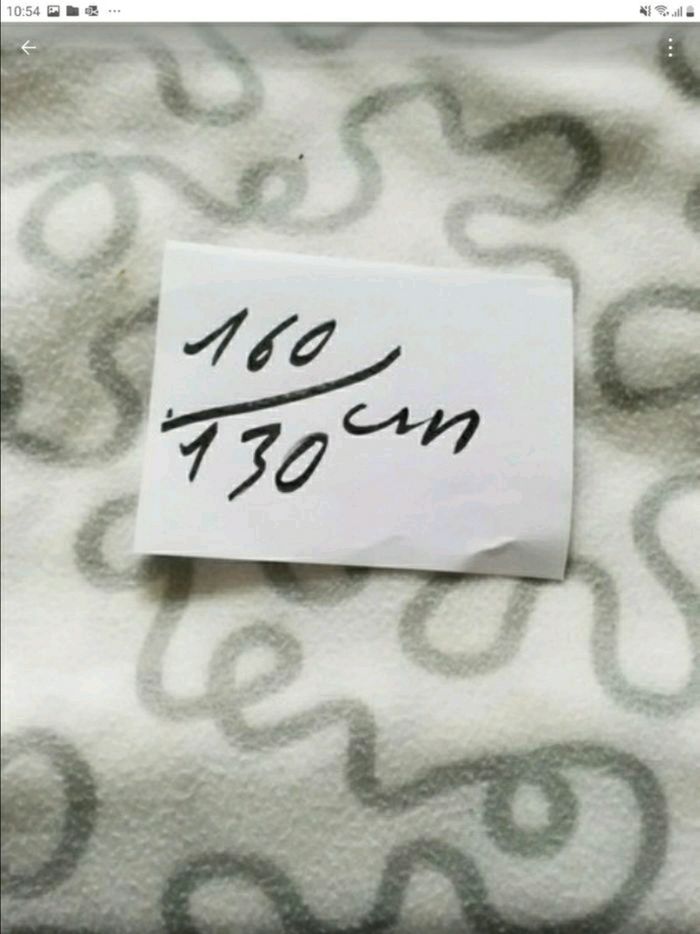 Plaid  gris blanc taille 160 /130 cm très bon état