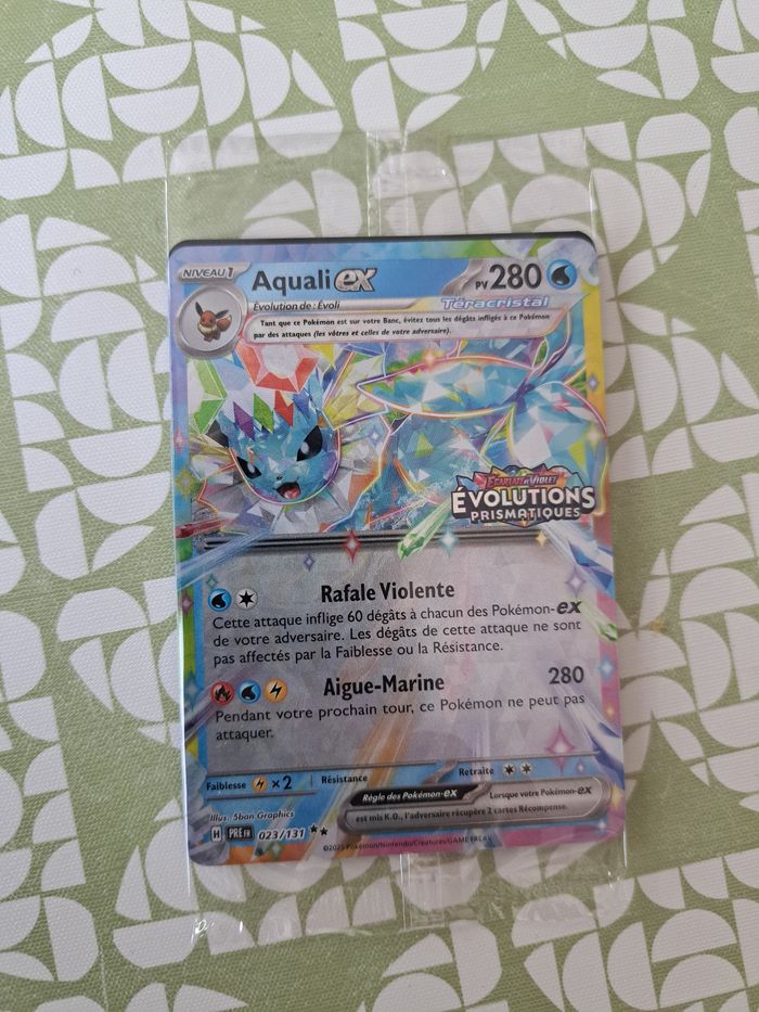 Carte pokemon aquali évolution prismatiques