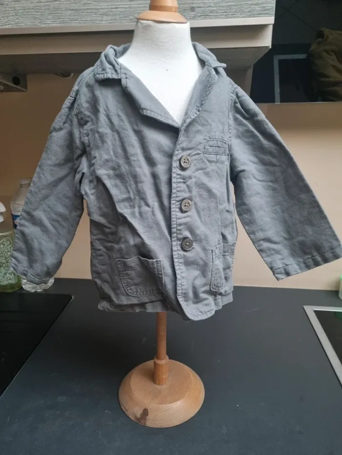 Veste grise à boutons