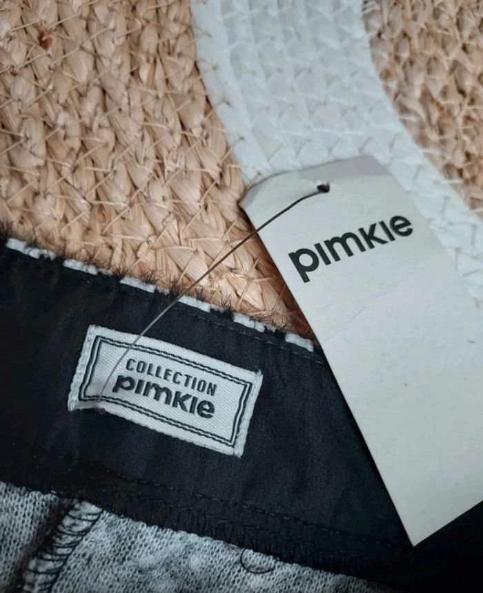 Jolie jupe neuve hiver Pimkie motif pied de poule noir et blanc
Taille 34 - photo numéro 4