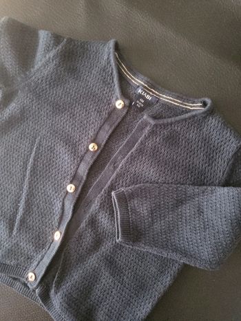 Gilet avec boutons dorés