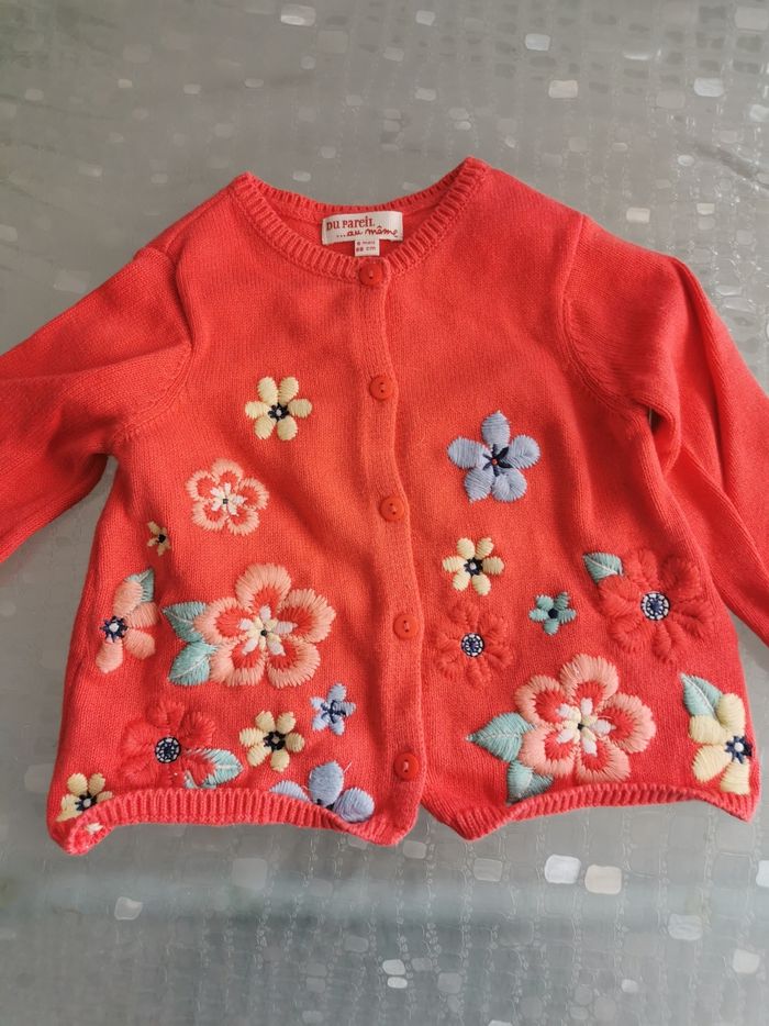 Gilet bébé corail