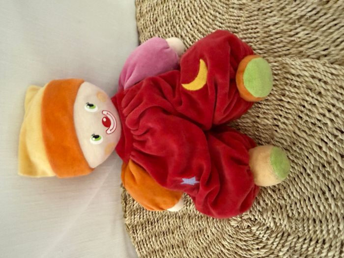 Doudou clown jaune orange rouge lune étoile COROLLE