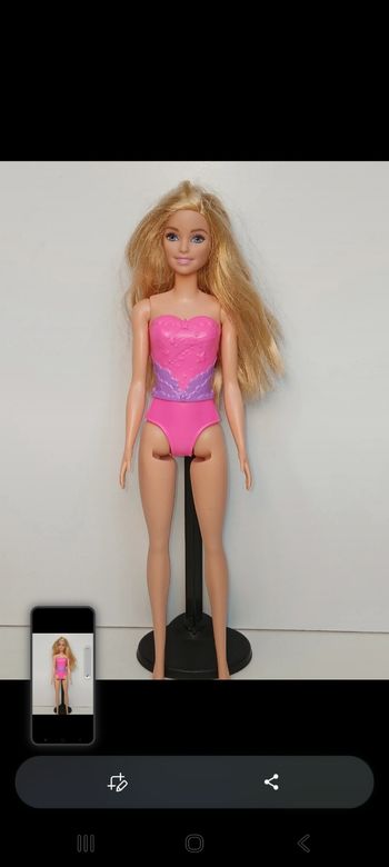 Poupée mattel barbie maillot fushia et mauve tête 2013 corp 2017 
Poupée et ensemble compris