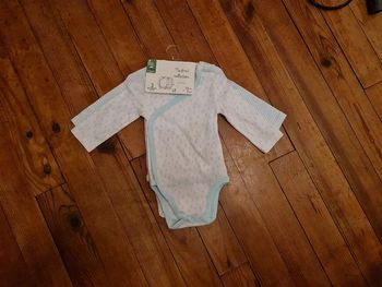 Lot de 2 bodys orchestra taille 3 mois neuf