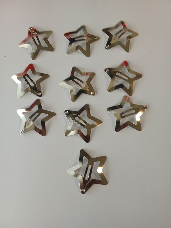 10 barrettes argentées étoiles neuves