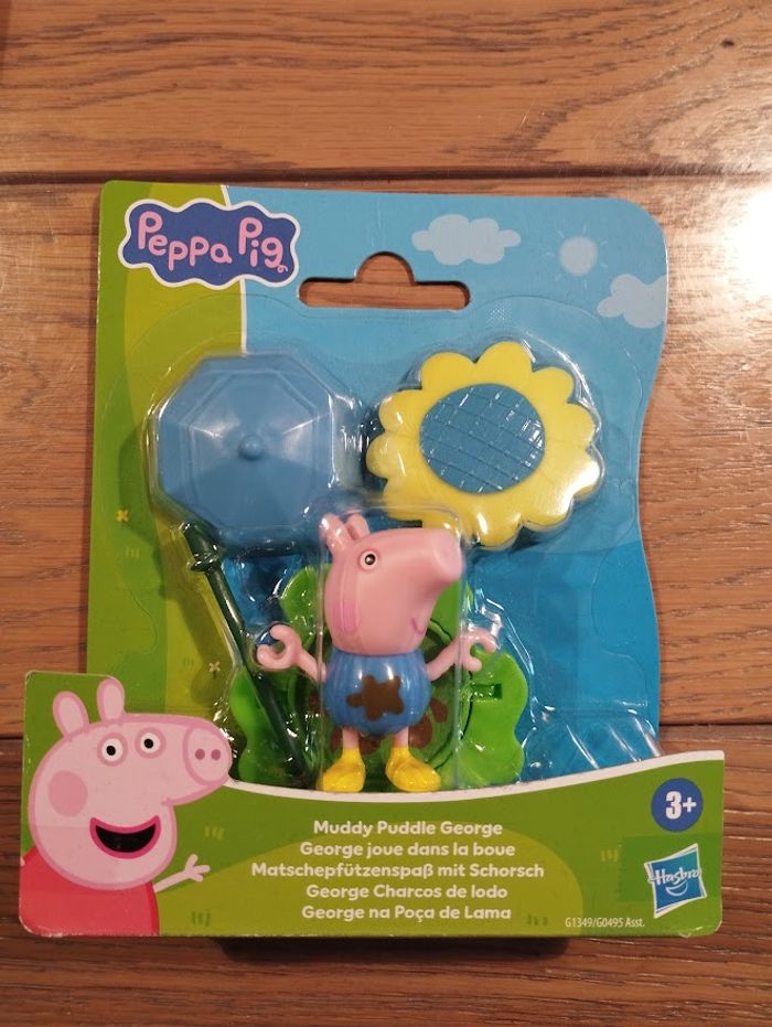 NEUF Figurine "George joue dans la boue" Peppe Pig - photo numéro 1